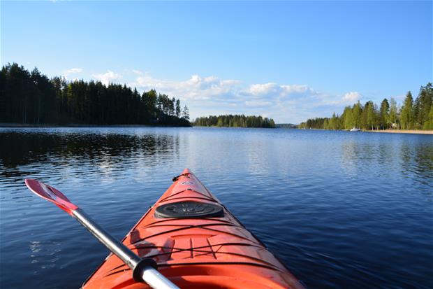 Kayak paddling at Saimaa.